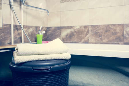 Blurred bathroom interior background and white spa towels on Marble Bathtub Mirror Faucet