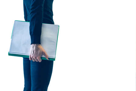 A girl with a folder of papers on white background. isolate.の写真素材