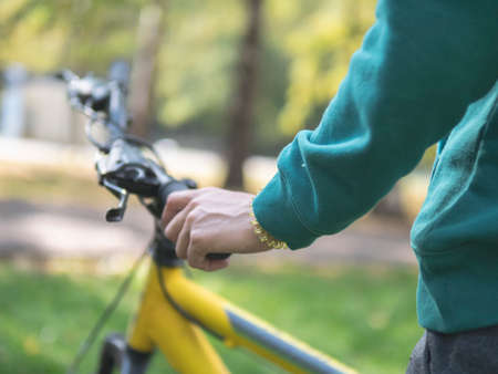 Young woman riding a bike in the summertimeの写真素材