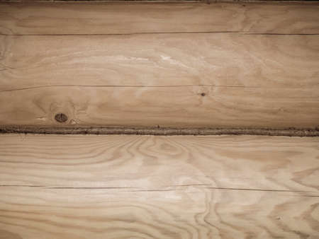 Wooden wall from logs as a background textureの写真素材