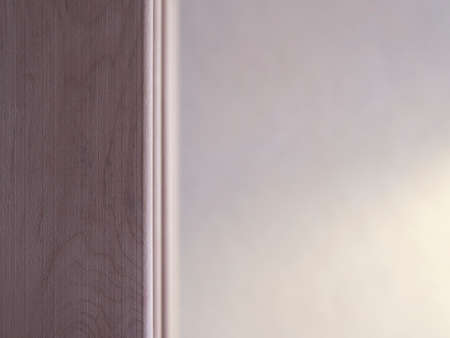 A wooden rail on a background of blurred white walls.の写真素材