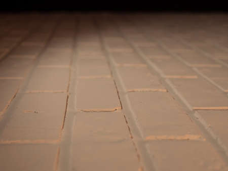 Modern white brick wall texture for background. Warm light yellowの写真素材