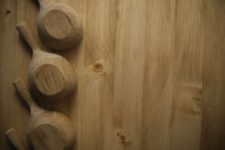 wooden spoons on a wooden table.Brown natural background. Ancient Japanese culture. Retro style. Spoons in a row.の写真素材