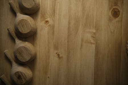 wooden spoons on a wooden table.Brown natural background. Ancient Japanese culture. Retro style. Spoons in a row.の写真素材