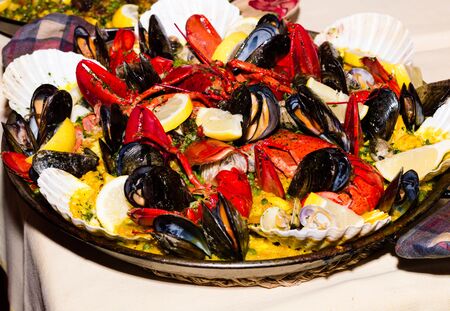 Paella with lobster and musselsの写真素材