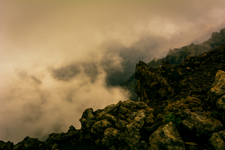 The force of nature: fog in a volcanic landscapeの写真素材