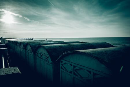 The sea and the abandoned beach: image with cool and dramatic tonesの写真素材
