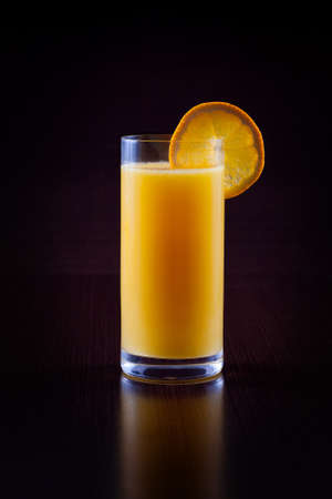 Orange juice on blackの写真素材
