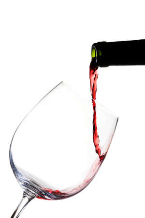 Red wine pouringの写真素材
