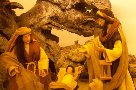 Christmas crib with Jesus, Mary and Joseph warm colorsの写真素材