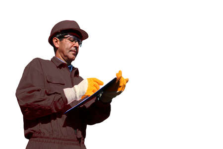 Quality control engineer writing on notepad on a white background