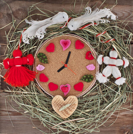 Watch with hearts in the nest. Two white birds, a boy and girl from the red and white threads....