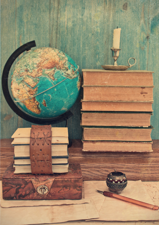 old books and globeの写真素材