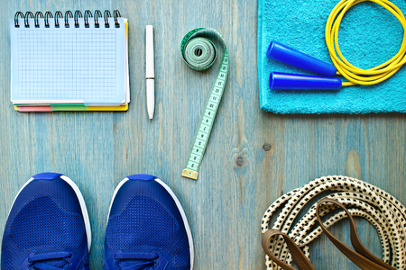 Accessories for the fitness classes on a blue wooden backgroundの写真素材