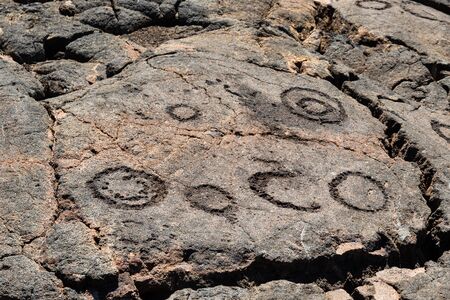 Petroglyphs in Waikoloa Field, on the King's Trail (Mamalahoa), near Kona on the Big Island of...