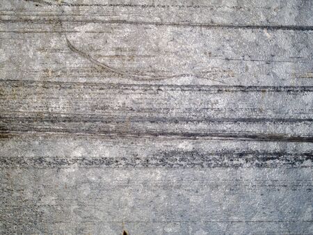 Stock macro photo of the texture of scratched metal.  Useful for grunge layer masks and abstract backgrounds.の写真素材