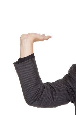 Isolated studio shot of a businessman's arm raised as if carrying an object.の写真素材