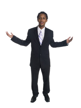 Isolated studio shot of a businessman raising his arms in disbelief at while looking at the camera.の写真素材