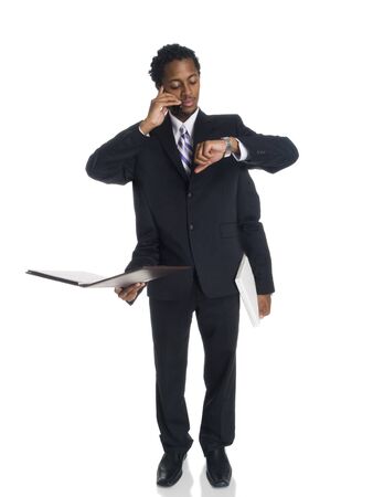 Isolated studio shot of a multitasking businessman with four arms.の写真素材