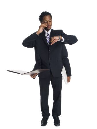 Isolated studio shot of a multitasking businessman with four arms.の写真素材
