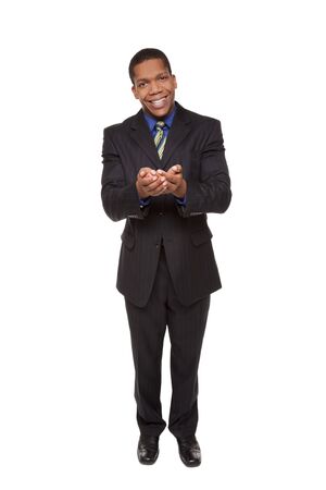 Isolated studio shot of a businessman holding out his hands, cupped as if he were holding something delicate.の写真素材