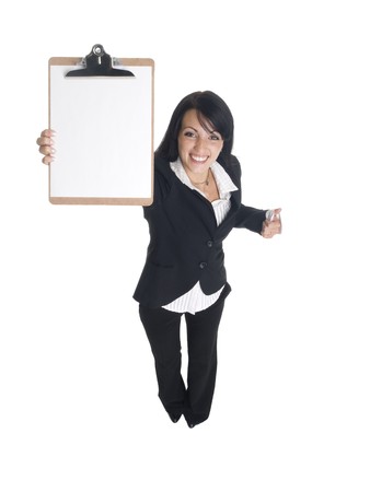 Isolated studio shot of a businesswoman presenting a blank clipboard.の写真素材