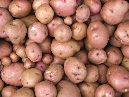 Red Potatoes background featuring organic at a local Farmers Market.