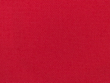 Stock macro photo of the texture of red fabric.  Useful for layer masks and abstract backgrounds.の写真素材