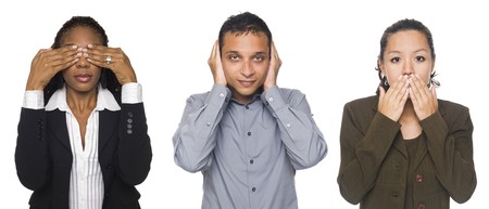 Isolated studio shot of businesspeople in the See No Evil, Hear No Evil, Speak No Evil poses.の写真素材