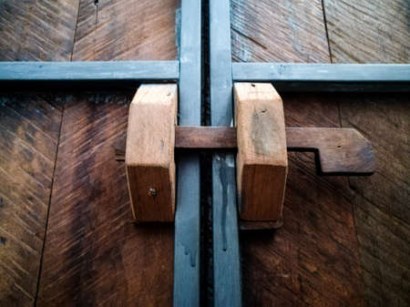 Latch vintage style on the toilet door at a coffee shop.の写真素材