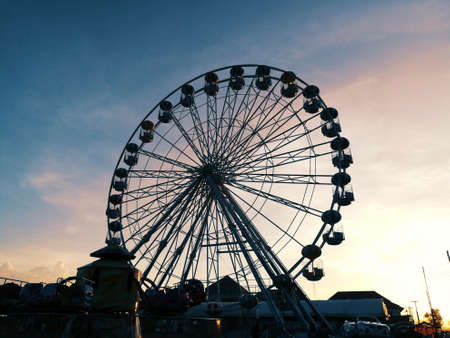 KRABI, THAILAND - APRIL 11, 2018: Ferris wheel at the sunset of annual festival  on April 11, 2018 at Krabi,Thailand.の写真素材