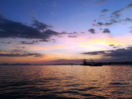 Krabi,Thailand-April 2018 - Sunset at Bridge on the water, Baan Koh Kwang, Klong Muang ?Beach,Krabi,Thailand.の写真素材