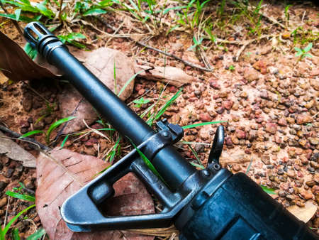 Close-up of M16 A2 on the ground.の写真素材