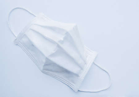 White medical mask protection against pollution and virus.Top view background.の写真素材