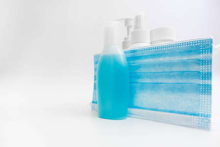 Gel and Surgical mask background.の写真素材