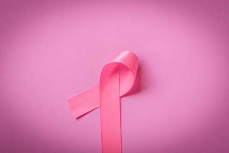 Pink ribbons on pink background .Breast cancer awareness.World cancer day.