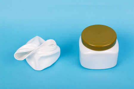 recyclable plastic box on blue backgroundの写真素材