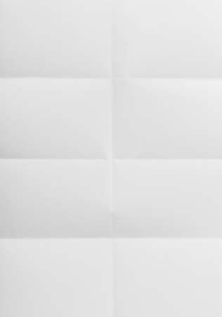white sheet of paper folded in eightの写真素材