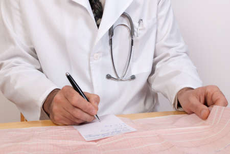 Medical doctor working in the officeの写真素材