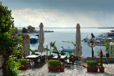 a small bistro on the sea beach in the summer