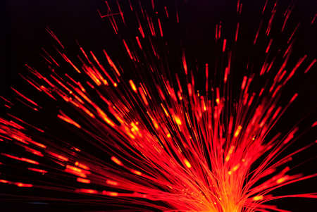 Fiber light in red on black backgroundの写真素材