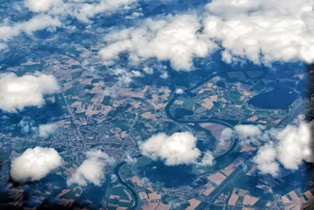 Aerial view from plain with clouds