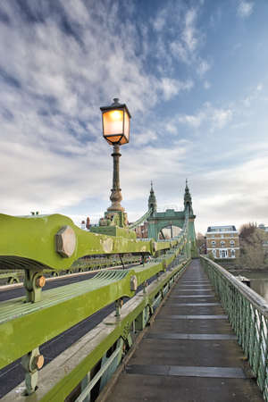 Hammersmith Bridge over river Thamesの写真素材