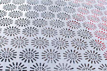 Perforated metal sheet in white for decorationの写真素材