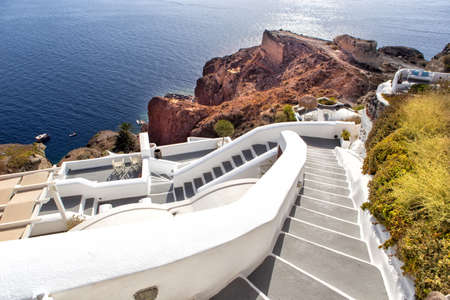 Panorama view of Santorini caldera In the Santorini island there are small villages with white houses, narrow streets and amazing seaviews.の写真素材