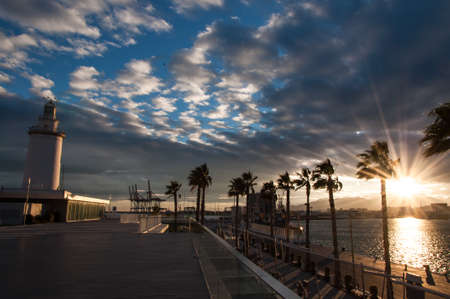 Photo of Lighthouse in Malaga in Andalusia, Spain at sunset