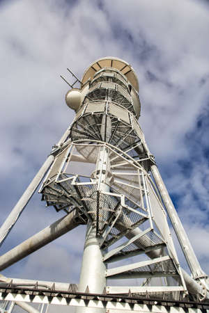 BOURNEMOUTH, ENGLAND - DECEMBER 21, 2014: The launch tower at the end of Bournemouth Pier. The zip wire line linking up a tower with a landing stage on the beach.のeditorial素材