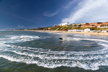 BOURNEMOUTH, DORSET, ENGLAND-JANUARY 16 2015: Sunny weather brought visitors and surfers to Bournemouth on the Dorset coast to enjoy the winter sunshine on Friday 16th January 2015のeditorial素材