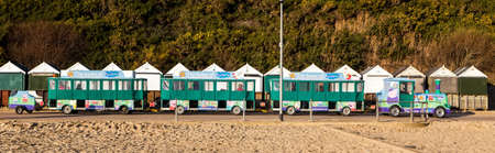 BOURNEMOUTH, DORSET, UK. DECEMBER 30, 2014. The beach train running along the promenade at Bournemouth in Dorset, UK.のeditorial素材