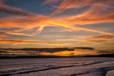 Sunset over the oceanの写真素材